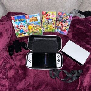 Nintendo Switch OLED WITH 4 GAMES
